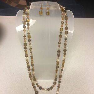 Brown and gold necklace and earrings.